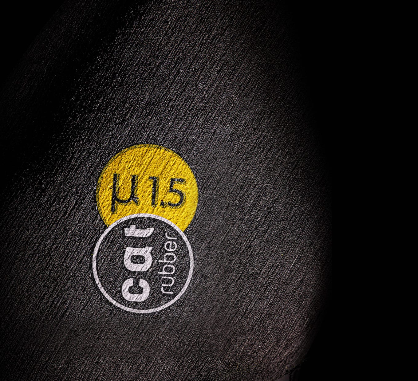 Close-up of the CAT rubber outsole stamp reading µ1.5